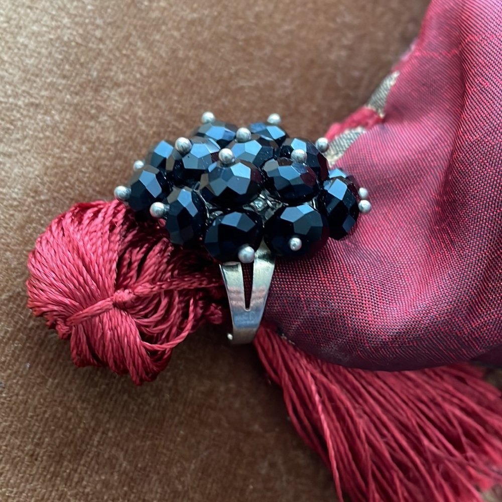 Silver ring with black cluster of beads